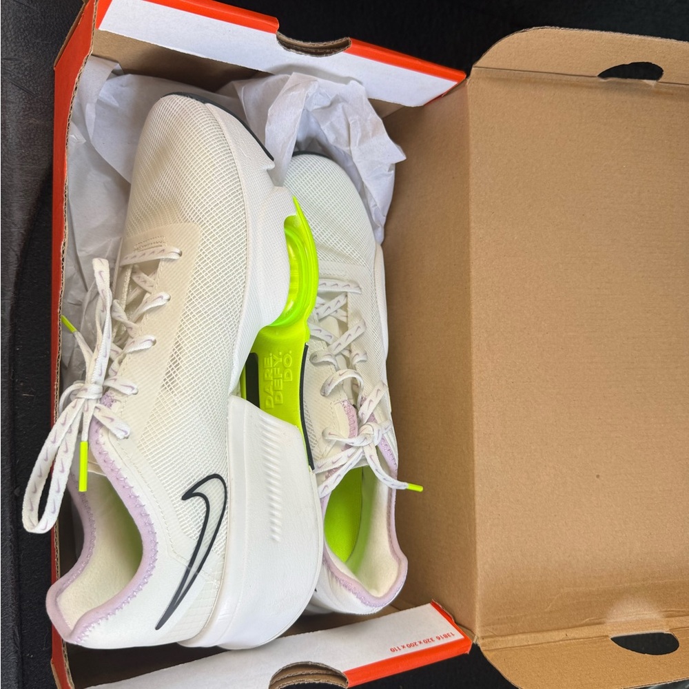 Nike Women's Off-White Running Shoes with Neon Green Accents